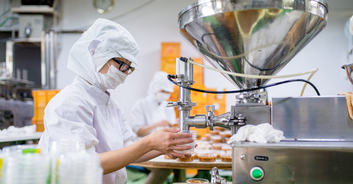 Modern manufacturing factory floor with automated production lines
